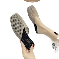 Beige mesh slip-on shoe.