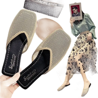 Beige mesh slip-on shoes.