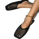 Black mesh mule shoes.