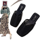 Black mesh mule shoes.