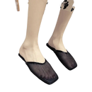 Black mesh slip-on shoes.