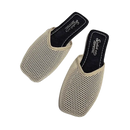 Pair of beige mesh mules.