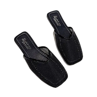 Pair of black mesh slip-on sandals.