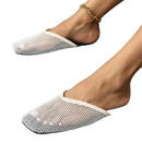 White mesh slip-on shoes.