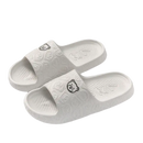 White bear-themed slide sandals.