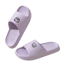 Lavender cartoon bear slippers.