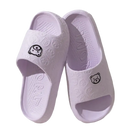 Pair of lavender cartoon-themed slide sandals.