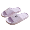Lavender bear-themed slide sandals.