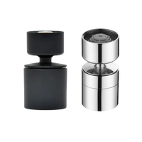 Two faucet aerators, black and silver.