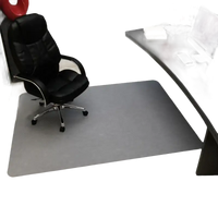 Rectangular gray chair mat.