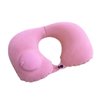 Pink inflatable travel neck pillow for hilarious travel antics, trendy and comfy