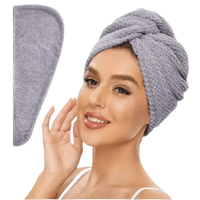 Gray hair towel wrap.