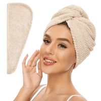 Beige hair towel wrap.