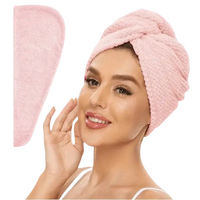 Pink hair towel.