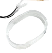 Clear, coiled plastic strip.