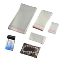 Clear plastic bags with adhesive strips.