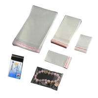 Clear plastic bags with adhesive strips.