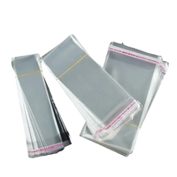 Stacks of clear cellophane bags.