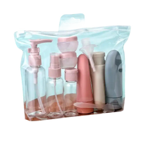 Clear travel toiletry bag with assorted containers.