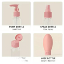 Four travel-sized cosmetic bottles.