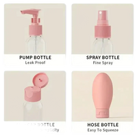 Four travel-sized cosmetic bottles.