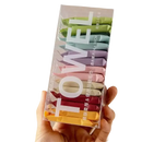 Box of individually wrapped, colorful compressed towels.