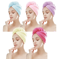 Colorful hair-drying towels from Trendy Backless Bath Towel for Swirl and Sassy Hair Days
