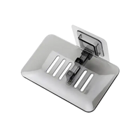 Gray plastic wall mounted drain soap holder for funky bathroom storage