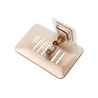 Brown plastic drain soap holder with adhesive mount for trendy bathroom storage