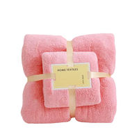 Pink towel set with ribbon from the Trendy Coral Bath Set Towel Shenanigans, soft and highly absorbent for your bath time