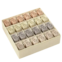 Organized drawer of rolled socks in a stylish storage organizer for socks storage fun