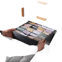 Stylish storage organizer with folded clothes, perfect socks storage box, trendy look