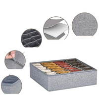 Gray fabric drawer organizer perfect for stylish storage of socks, underwear, and bras