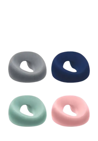 Colorful donut-shaped cushions for Ergoluxe Memory Foam Beauty Pillow for comfortable ergonomics lying