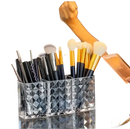 Three-compartment makeup brush holder in a trendy diamond chic bathroom with patterned mirror cabinet