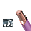 Rose gold and purple facial hair remover.