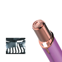Rose gold and purple facial hair remover.