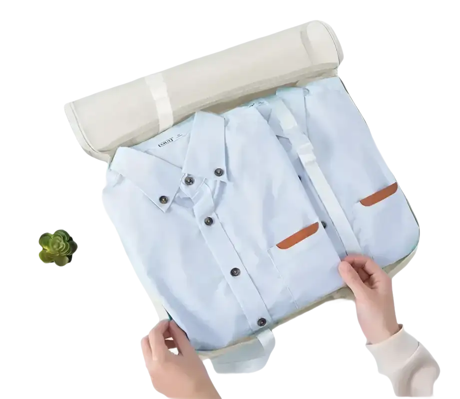 Folded light blue shirts in trendy set travel organizer for travel storage