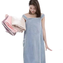 Woman in trendy blue spa towel wrap for beach spa towel party style