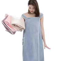 Woman in trendy blue spa towel wrap for beach spa towel party style