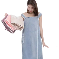 Woman in trendy blue spa towel wrap made from girls wearable 140*85cm beach spa towel