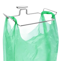 Trendy trash rack for stainless steel cabinet with green plastic bag in kitchen