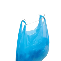 Blue plastic bag hanging on trendy trash rack in stainless steel cabinet setup
