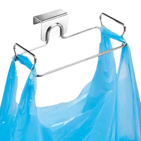 Over-the-cabinet trash rack with blue plastic bags for stainless steel cabinet storage