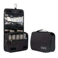 Black toiletry bags on trendy waterproof makeup organizer for stylish travel prep