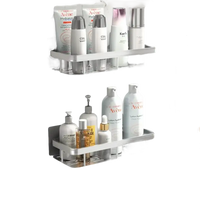 Silver bathroom shelves with toiletries.