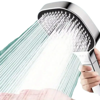 Handheld shower head with water streams.