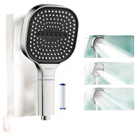 Square chrome shower head with filter.