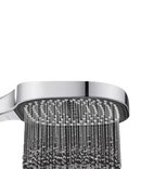 Square shower head with water flowing.