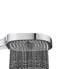 Square shower head with water flowing.